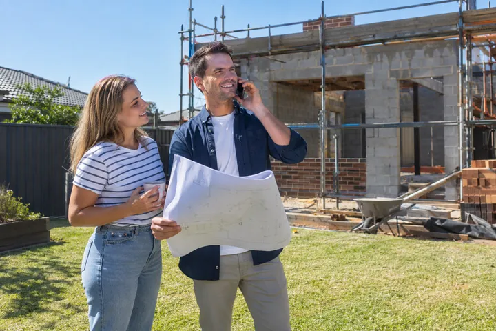 Homeowner calling about an extension quote while builder is on site