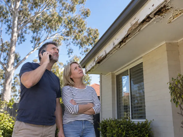 Homeowners enquiring about Colorbond fascia and soffit replacement