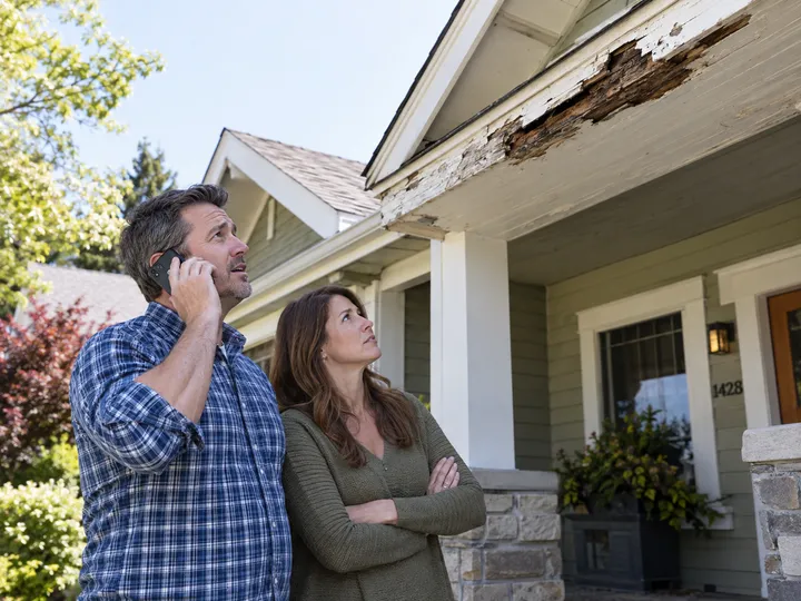 Homeowners inquiring about fascia and soffit replacement