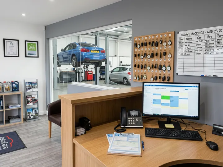 AI receptionist capturing safety inspection booking details for auto repair shop