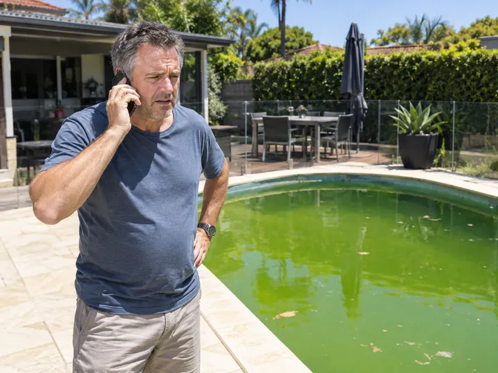 Homeowner calling about pool fencing compliance inspection