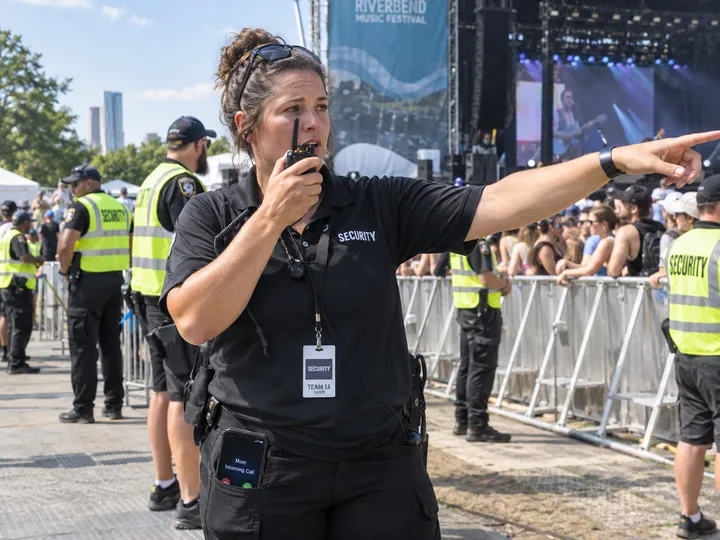 Security team at event while AI handles incoming call