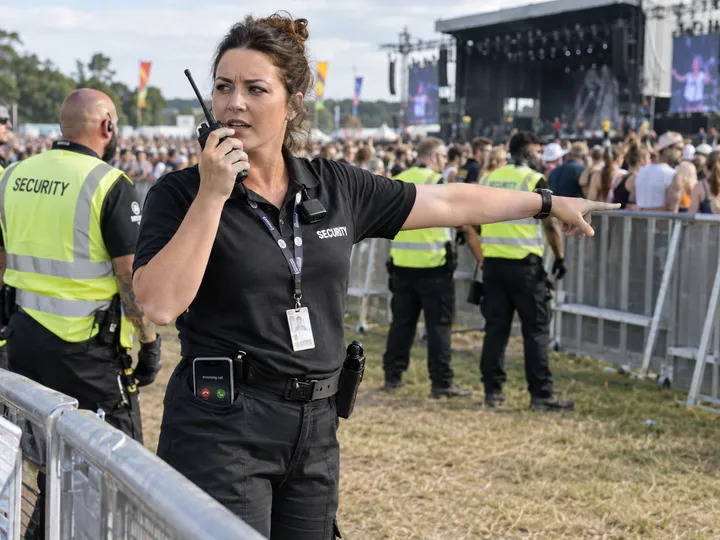 Security team at event while AI handles incoming call