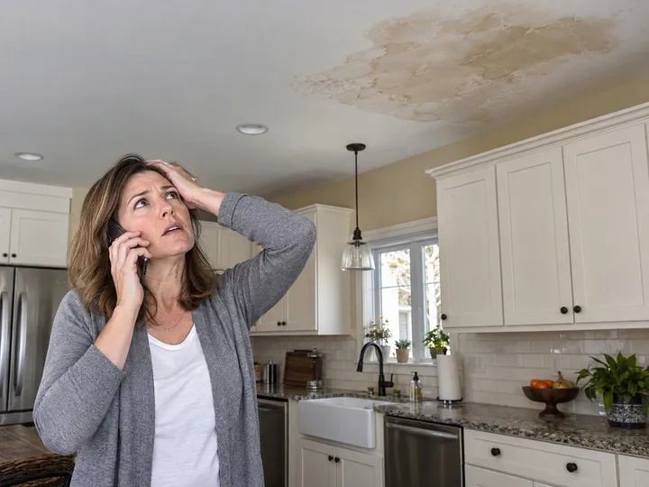 Homeowner urgently calling contractor about water damage